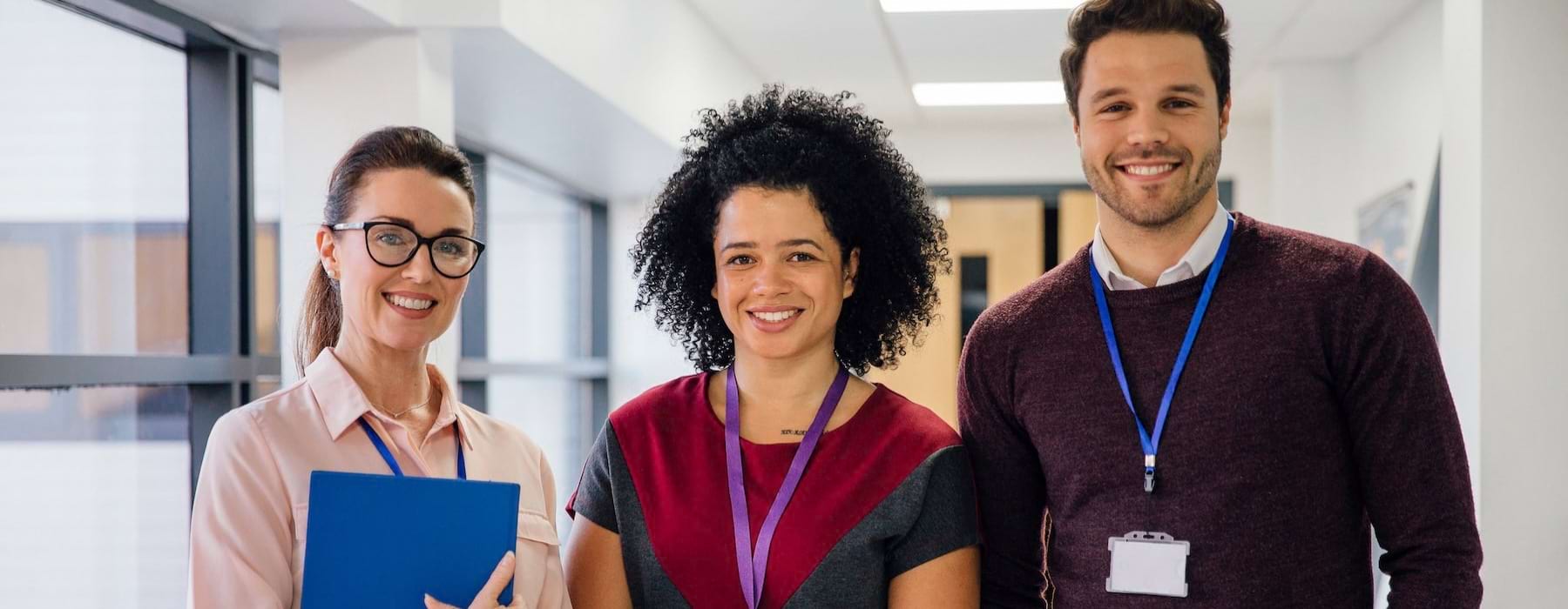 three people smiling